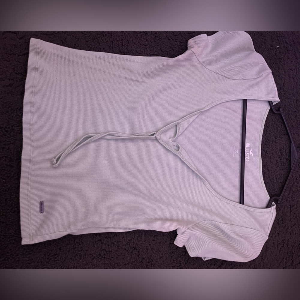 Light green t shirt, small bleach stain on back